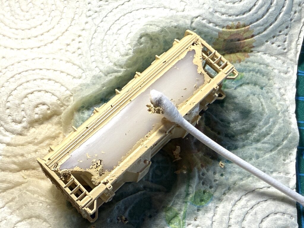 Manual paint stripping with cotton swab