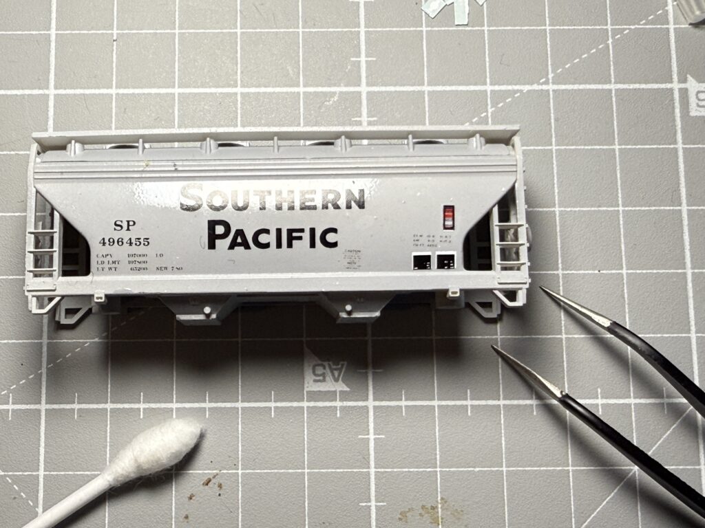 Repainting a covered hopper: decals applied.