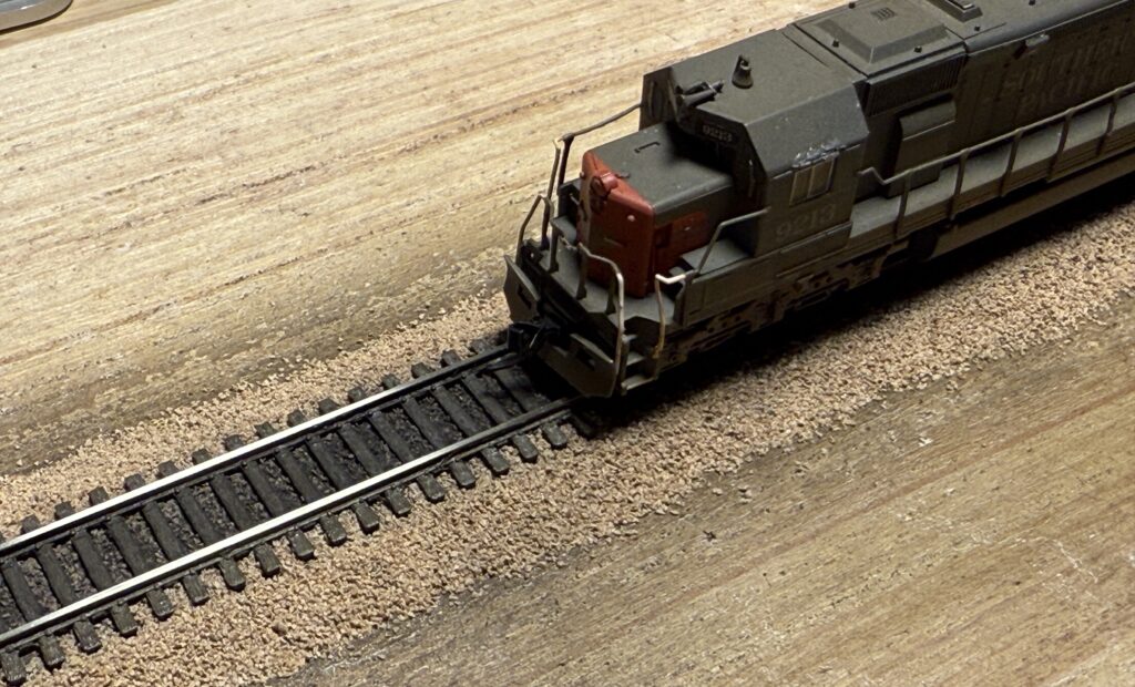 N scale diorama: ballast complete, track weathered and an SP Intermountain SD45-T2