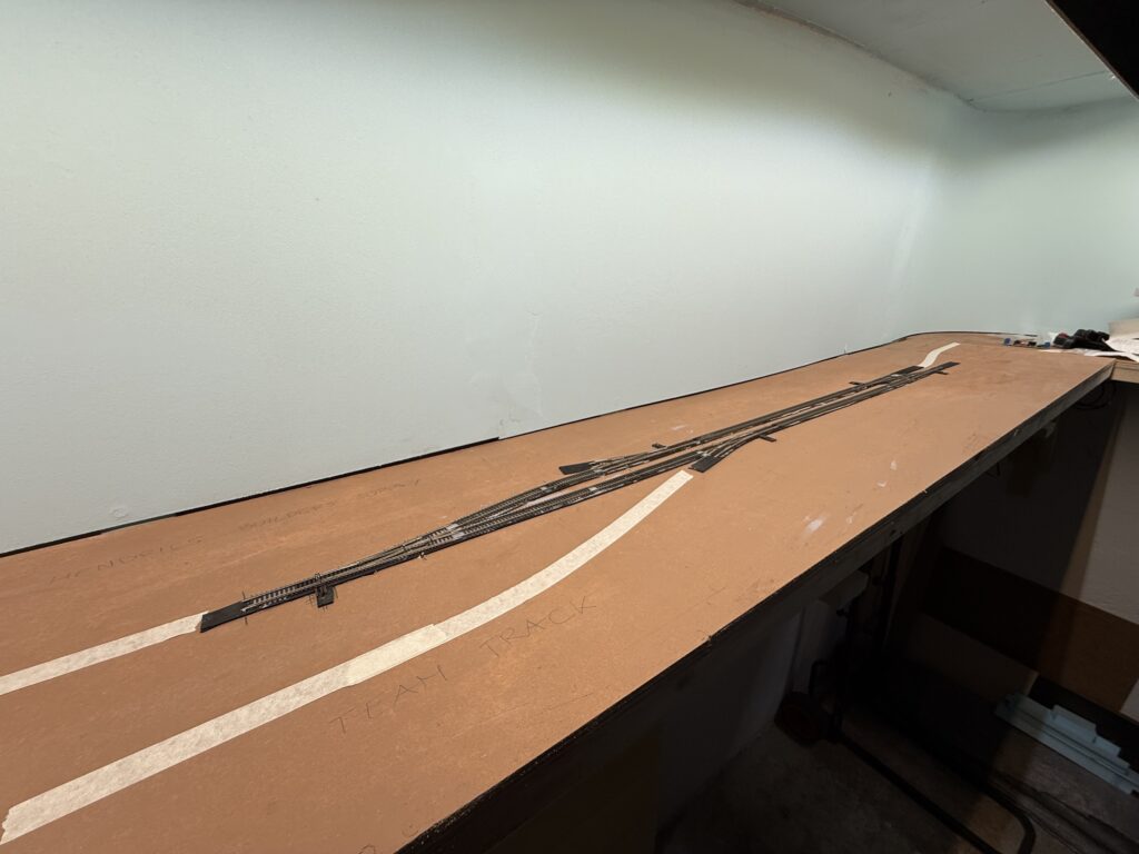 Wiring and Laying Tracks: main line and siding.