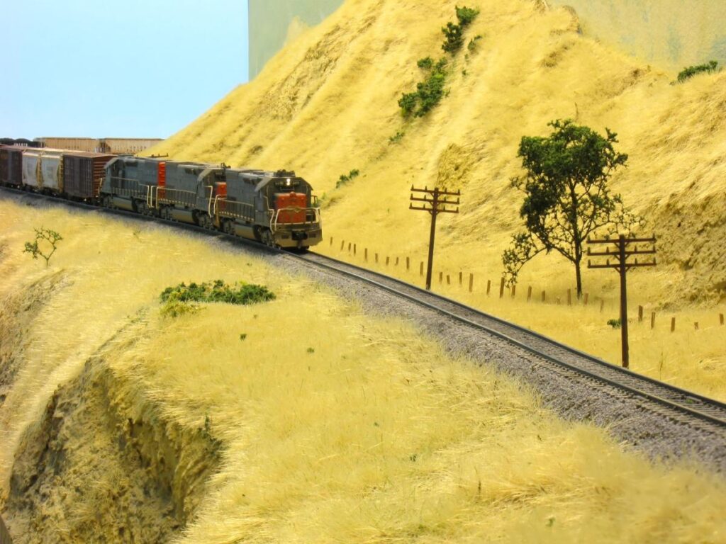 SP Coast Line in N Scale. Three SP Tunnel Motors leading a manifest train to Los Angeles.
