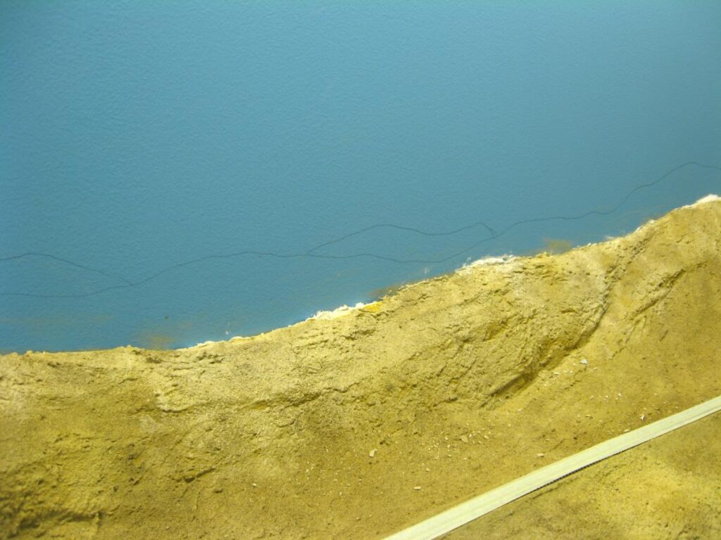 SP Coast Line in N Scale, distant mountains on the backdrop