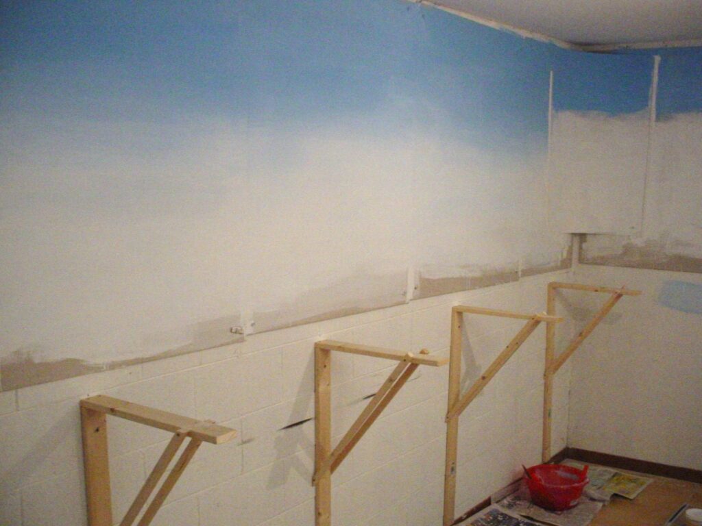 New home, new train room. Benchwork construction