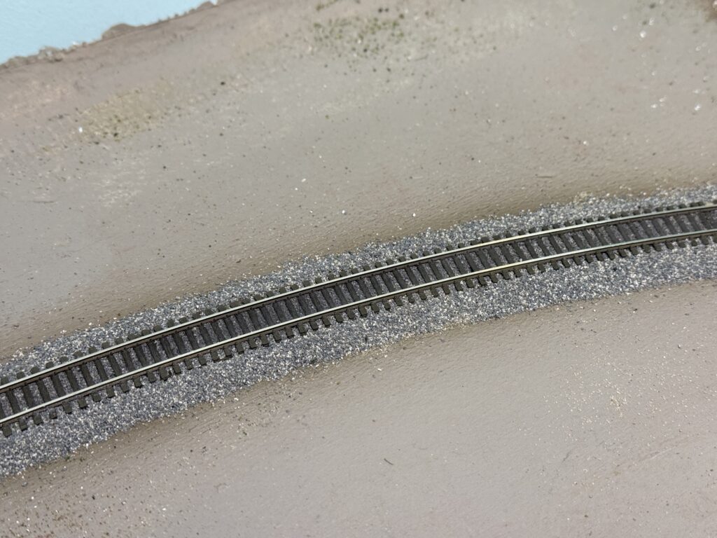 Structures and scenery update: track weathered with pigments and plaster of Paris