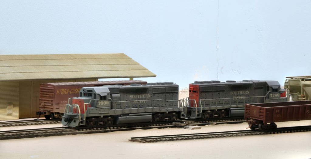 GP38-2 # 7609 and 7240 pulling a local freight train